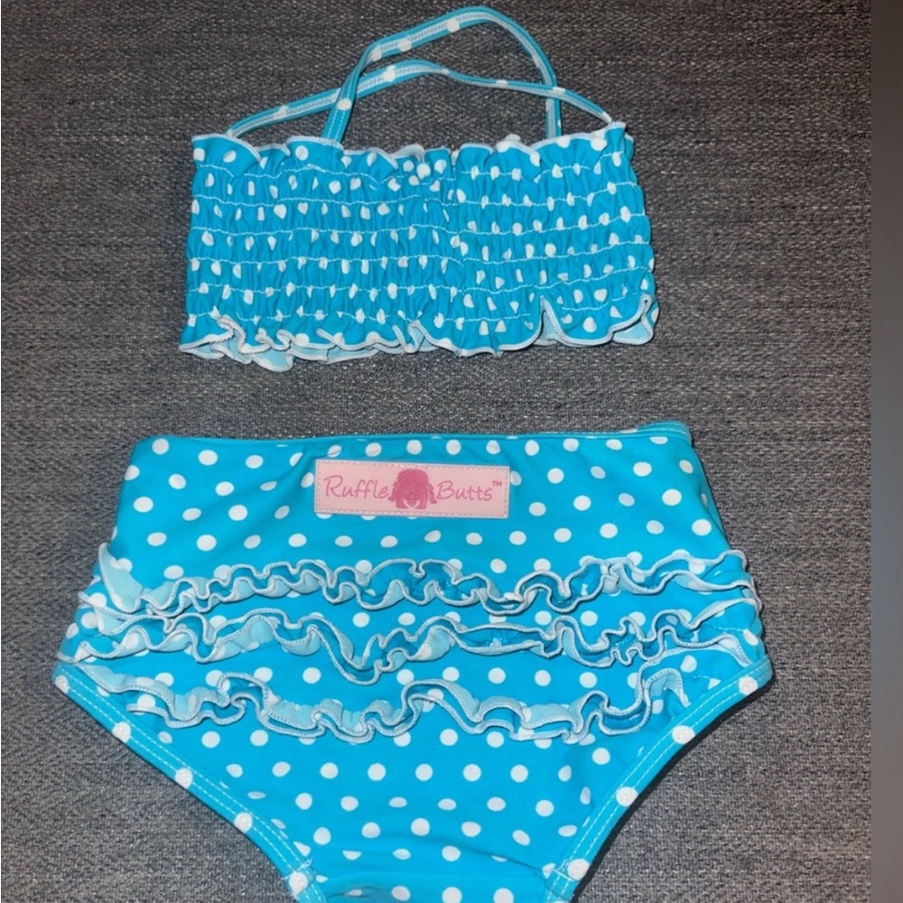 Ruffle butts 2 piece swim suit. Size: 2T